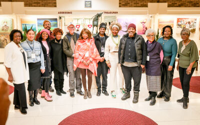  Officials stand with artists featured in “Duality and Depth” Jan. 15 at Southfield City Hall. The artwork will be on display until March 31. 