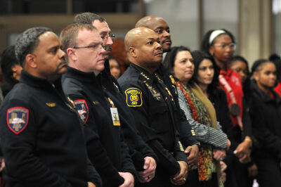  Southfield Police Chief Elvin Barren, fourth from left, stands with other city and state dignitaries, including Michigan Attorney General Dana Nessel, seventh from left, during the opening of the Martin Luther King Jr. Day Celebration Jan. 19 inside the Southfield Pavilion.  