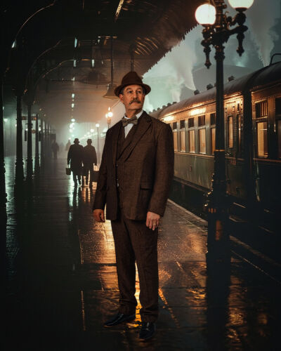  Bob Marselle portrays Agatha Christie’s famous Belgian detective, Hercule Poirot.  