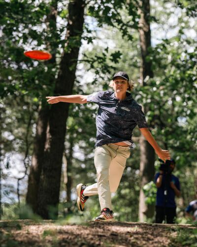  Ryan Monn tees off at Kensington Metropark during the 2024 Professional Disc Golf Association Amateur National Championships. 