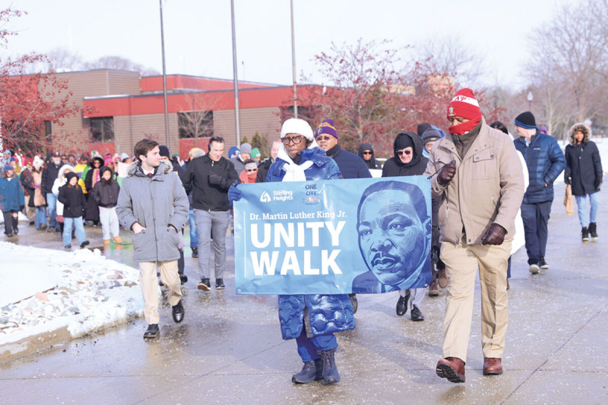  Carmen Williams, chairwoman of the Sterling Heights Ethnic Community Committee, leads participants in the Jan. 19 Unity Walk. 