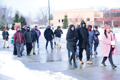  Frigid temperatures didn’t deter individuals from marching in honor of Martin Luther King Jr. Day in Sterling Heights. 