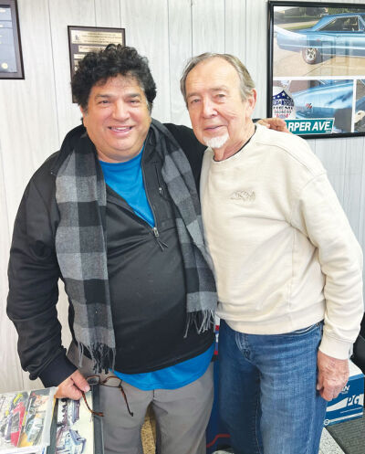  David Rubello, left, stands with John Skuza of Fleetwood Collision, which was one of the first businesses to advertise with the now-retired C & G Newspapers salesman in 1986. 