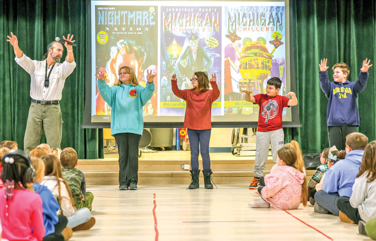  On a snowy Jan. 21, author Johnathan Rand interacted with children at Greenwood Elementary School and spoke about the importance and magic of reading, writing and books. 