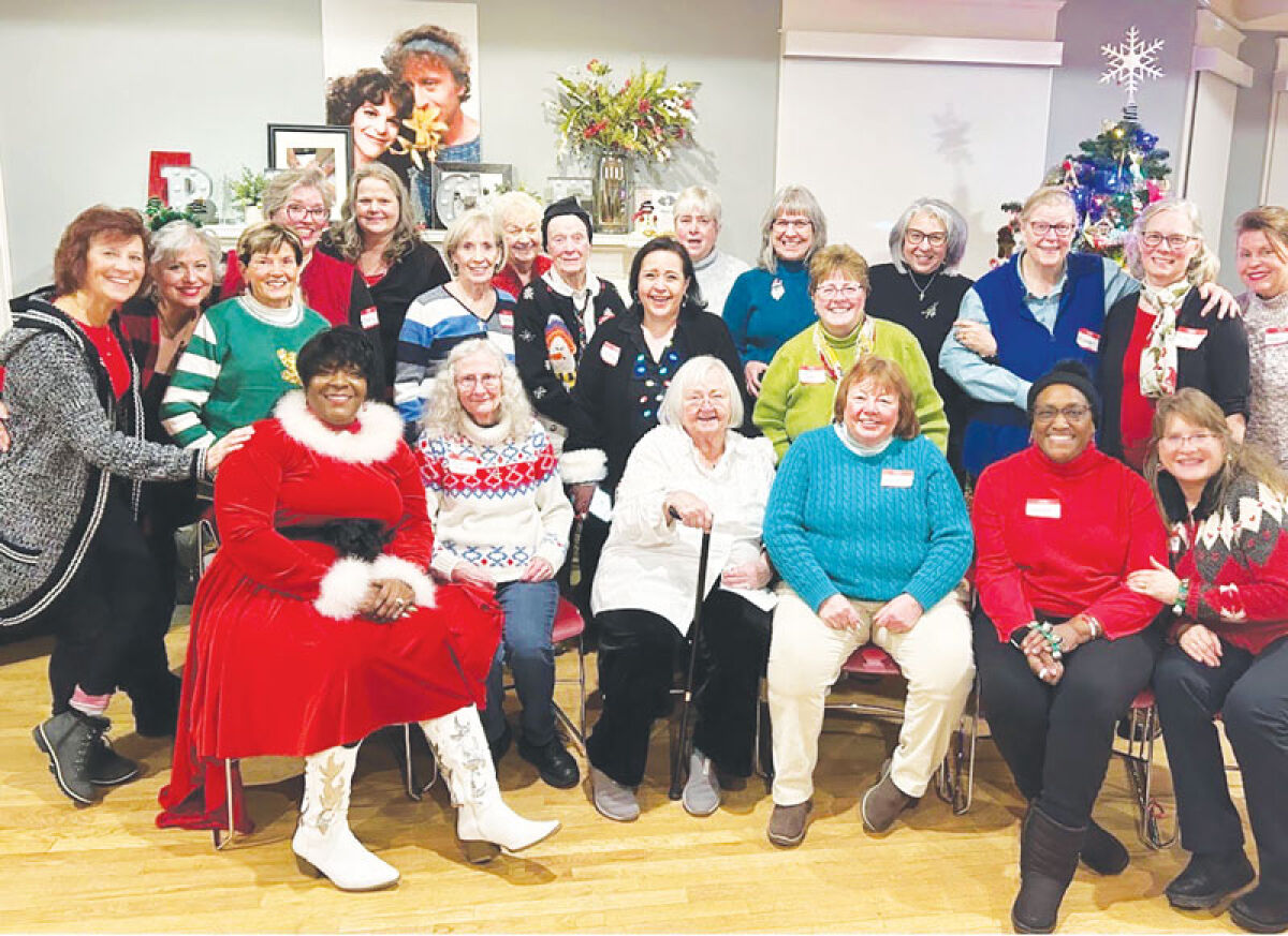  The One to One Ovarian Cancer Support group enjoys its holiday potluck last month. 
