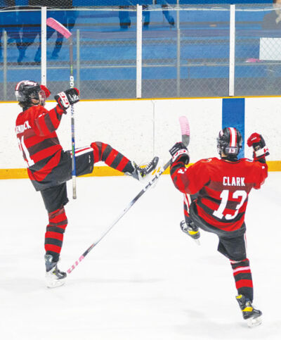 Matthew Van Raemdonck Joe Clark celebrate together Jan 12.