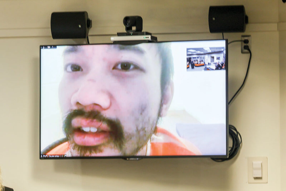  Changlin Li, of Novi, appears via video for his forensic exam and competency hearing on Jan. 14 at the 52-1 District Court in Novi. 