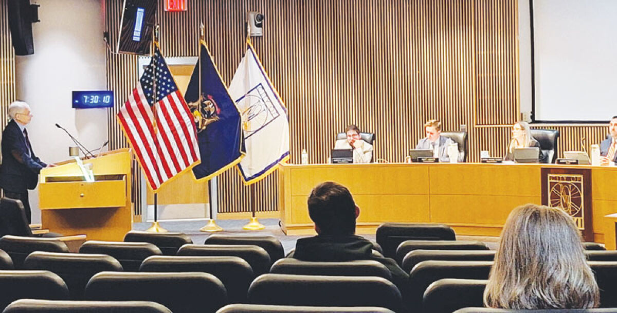  Lonny Zimmerman, president of Siegel/Tuomaala Associates, discusses plans for a development in the area of 10 Mile and Novi roads with the Novi City Council Jan. 26. 