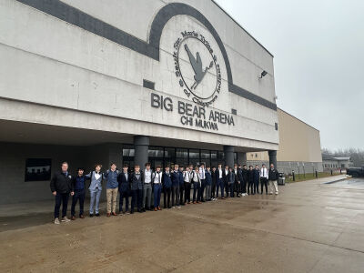  South Lyon Unified poses in front of Big Bear Arena in Sault Ste. Marie, Michigan, this past November. 