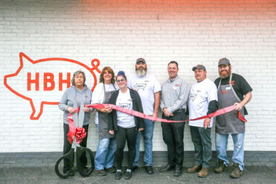  The staff of the Roseville Honey Baked Ham, many of whom have worked for the company for decades, attend the store’s 50-year anniversary Oct. 13, including General Manager Tina Gardzinski, far left.  