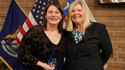  Anneliese White, left, received her Employee of the Year award from Sterling Heights Library Director Tammy Turgeon on Jan. 20. 