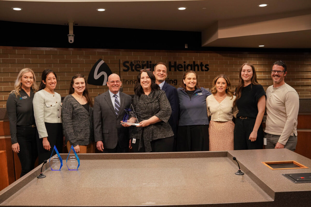  The Sterling Heights Community Relations Department was honored as 2025 Department of the Year. Staff members, from left, are Dawn Bondarek, Kimi Sugiyama, Ciara Fraser, City Manager Mark Vanderpool, Melanie Davis, Bob Sergott, Casey Wolfe, Marissa Russo, Abby Jenkins and Brian Figurski. (Not pictured: Dan Rizek, Diana Rogowski.) 