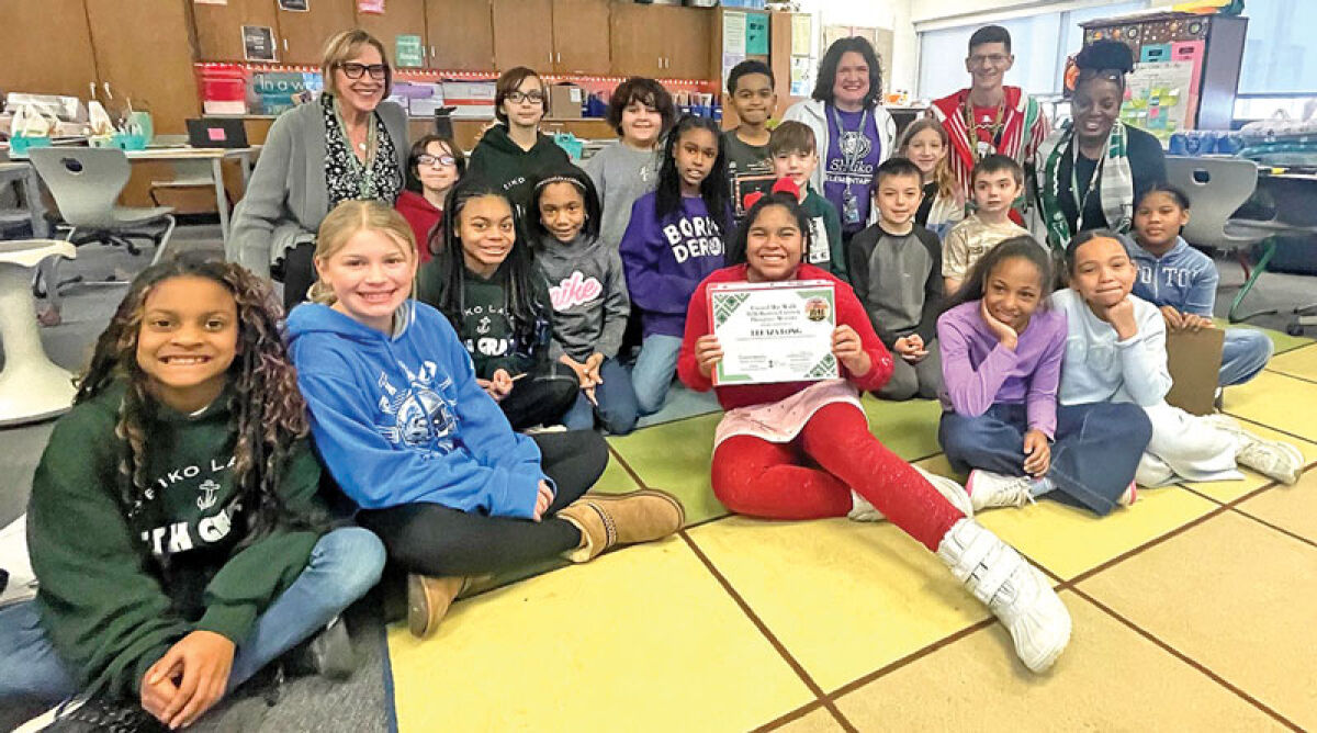  Eleaza Long, a fifth grader at Sheiko Elementary School, won the button design contest among 150 entries. 