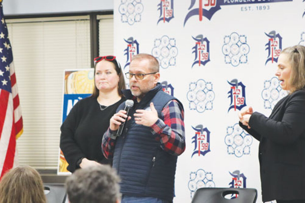  State Rep. Mike McFall, D-Hazel Park, center, speaks at an event Jan. 23 in Madison Heights, discussing a  state-run health care system proposed by state Rep. Carrie Rheingans, D-Ann Arbor, left.  