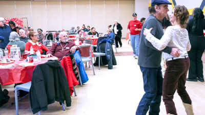  Bill Fox, of Roseville, left, and Merle Boniecki, of Warren, dance the afternoon away at the annual Fitzgerald High School senior prom Feb. 4. Every year, the school&rsquo;s 12th grade students, while in their senior year, invite senior citizens from the community to a senior prom. This year&rsquo;s dance had a Valentine&rsquo;s Day theme. 