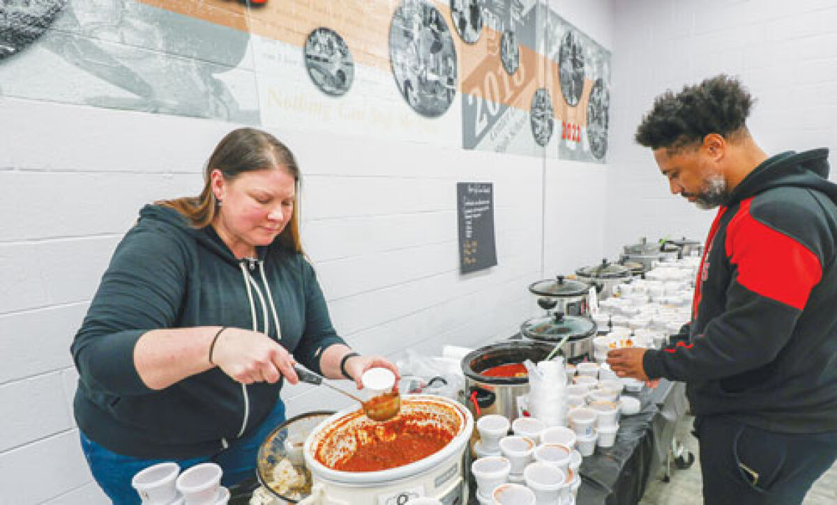  Center Line High School Athletic Director Ajani Ali, right, was the first-place winner in the Center Line Moms and Dads’ Club held on Jan. 24. In second place was Moms and Dads’ Club Secretary Stacey Masch, left.  
