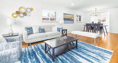  The living room in an Oak Park home should appeal to buyers with its neutral paint and decor.  