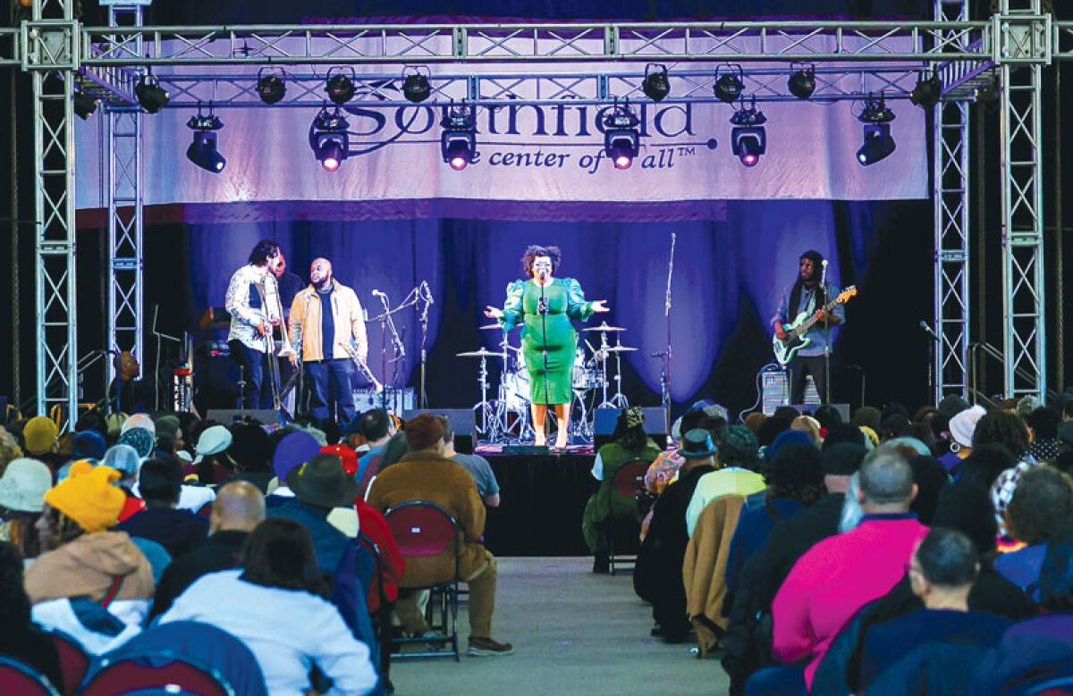  Music fans fill every seat to enjoy the music of Angela Davis and her band. 