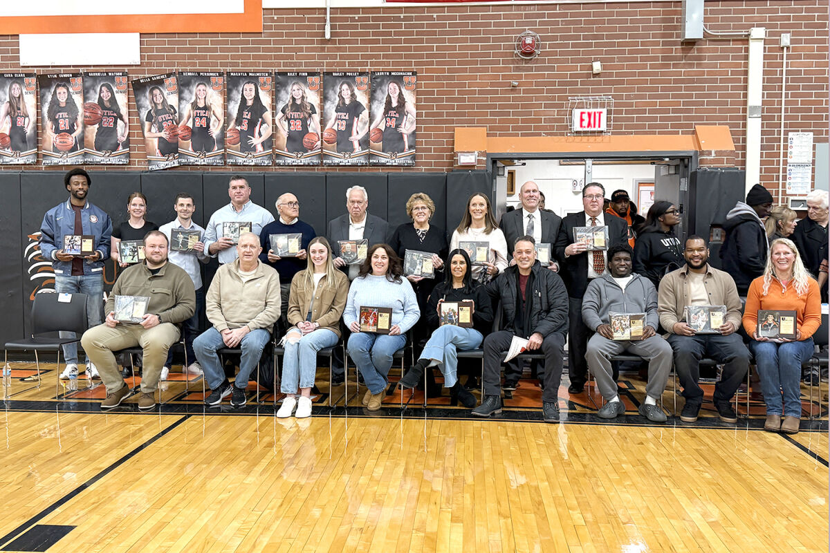  The Utica High School Hall of Fame Class of 2026 poses for a photograph after the induction ceremony at the school on Jan 16. 