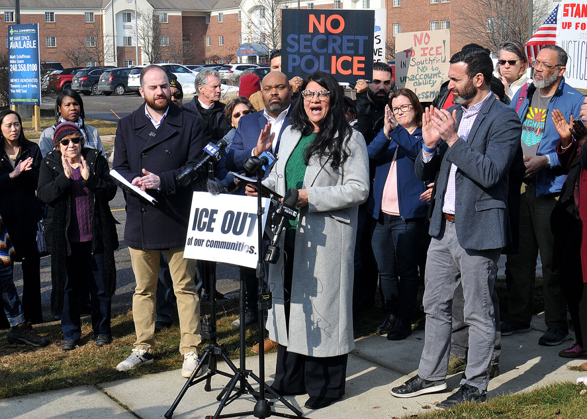  U.S. Rep. Rashida Tlaib, with state Sen. Jeremy Moss and state Rep. Jason Hoskins to her right and University of Michigan Regent Jordan Acker to her left, speaks to the media regarding the reported potential lease of office space for ICE administrative operations in Southfield on Feb. 17. 
