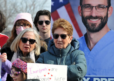  Residents stand next to a photo of Alex Pretti Feb. 17 while showing their opposition to a potential lease in Southfield for ICE operations. Pretti was killed during Operation Metro Surge in Minneapolis on Jan. 24. 