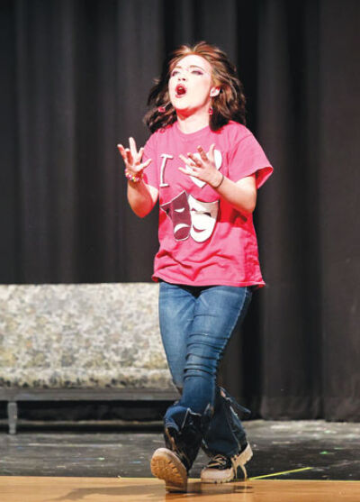  Axel Cochran rehearses her role as Lydia Deetz, the protagonist of the tale.  