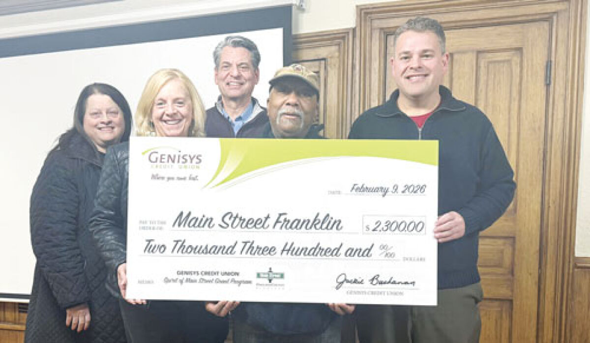  Main Street Franklin was presented a check for a grant from a partnership between  Genisys Credit Union and Main Street Oakland County Feb. 9.  