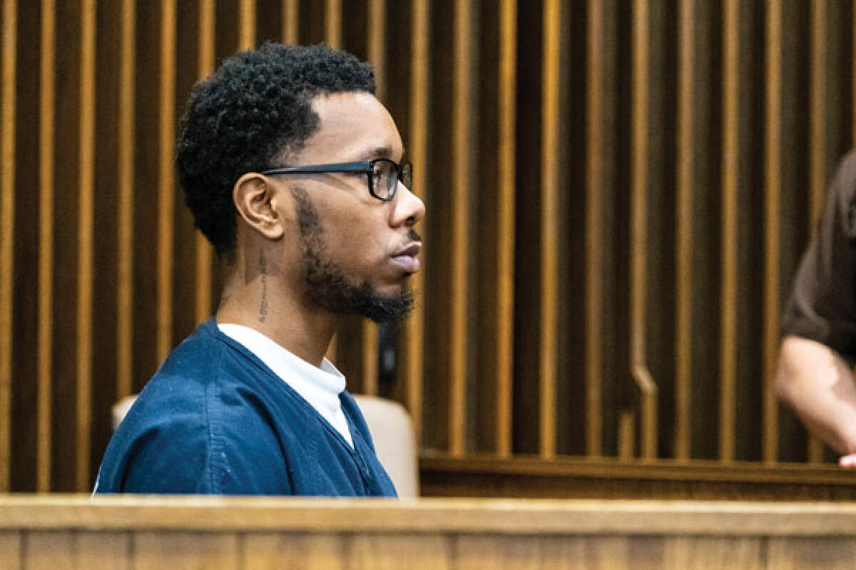  Michael Deshawn Altman-Tucker sits in the jury box during his preliminary exam hearing June 8 in the 39th District Court in Roseville. 