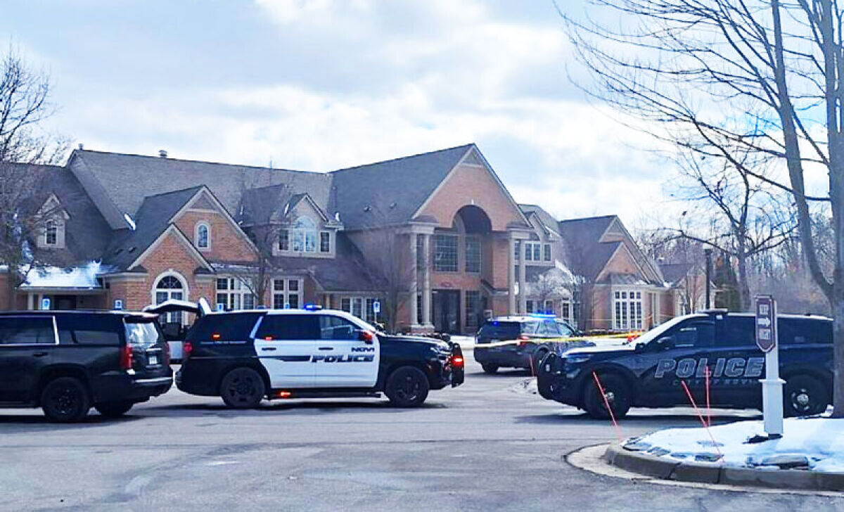  Novi police barricade the parking lot around the Central Park Estates office following a shooting on Feb. 25. 