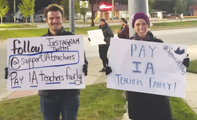  Teachers demonstrated near the International Academy campus in Troy Oct. 14, asking for a new letter of agreement recognizing that they work longer hours than their contemporaries in other schools. 