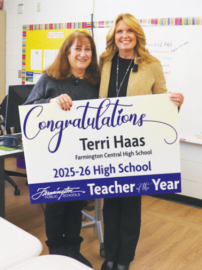  Terri Haas, left, seen here with Farmington Public Schools Superintendent Kelly Coffin,  was named the school district’s High School Teacher of the Year. Haas has taught social studies at Farmington Central High for 30 years. 