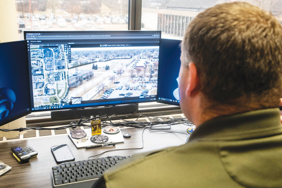  Warren Police Officer Sage-Thomas Wiggins operates a drone during a demonstration March 3 at the Warren Police Department. 