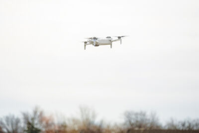  A drone being piloted by a Warren Police officer hovers outside the Christopher M. Wouters Warren Police Headquarters during a demonstration March 3. 