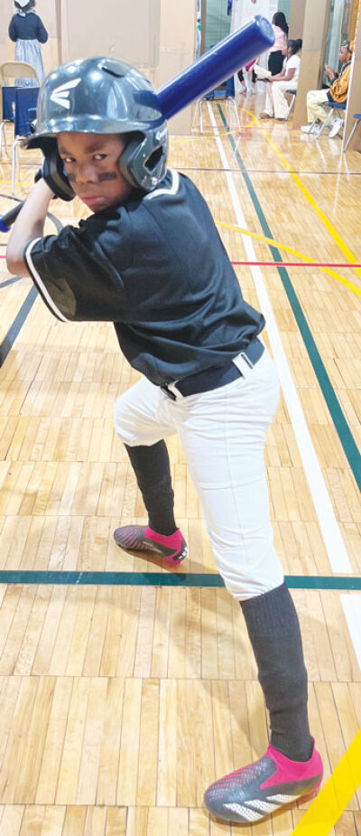  Fourth grader Michael Sollibellas Jr. researched Hank Aaron, who once held the Major League Baseball record for most home runs with 755. 