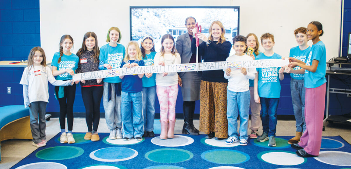  Students helped cut the ribbon Feb. 24 for the new renovations at Bingham Farms Elementary School.  