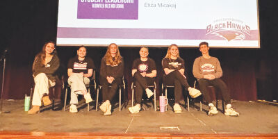  A student panel participates in last year’s parent workshop for high school parents.  