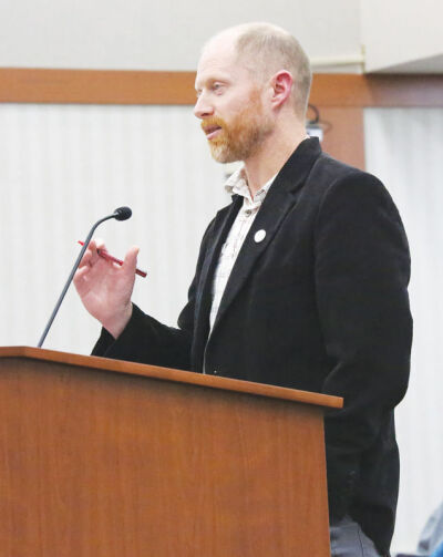  Macomb Township Department of Public Works Director Kevin Johnson speaks to the Board of Trustees about the Water and Sewer Five Year Capital Plan on Feb. 25. 