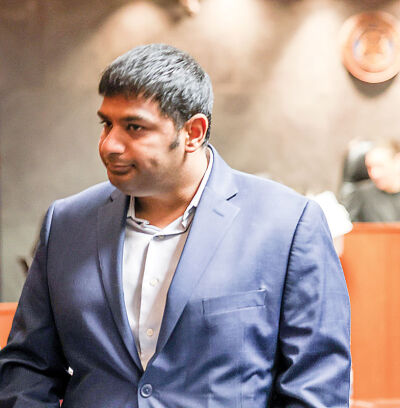  Sahil Massey, a former Wayne County sheriff’s deputy, listens as Judge Nanci Grant, of the Oakland County Circuit Court, sentences him for misconduct in office on Feb. 25. 
