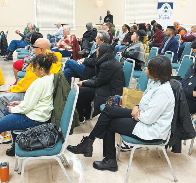  The audience listens to panelists on Feb. 26 at Lathrup Village City Hall. 