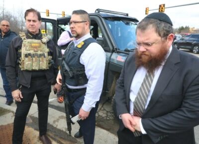  Oakland County Sheriff Michael Bouchard and West Bloomfield Police Chief Dale Young responded to the scene and briefed the press. Rabbi Benny Greenwald, Friendship Circle also on scene.  