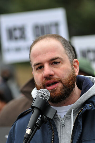 Michigan state Sen. Jeremy Moss, D-Southfield, speaks to protesters in Southfield on March 11.