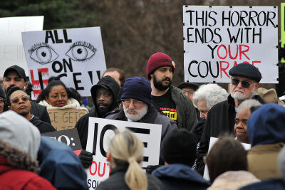  Protesters gather at a rally near One Towne Square on March 11. The protest was in opposition to a lease agreement between Redico and the U.S General Services Administration for office space allegedly for the Office of the Principal Legal Advisor, which acts as attorneys for Immigration and Customs Enforcement. 