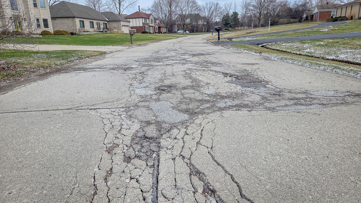  A stretch of Rainbow Circle on March 17 in Lathrup Village shows the trouble with the pavement that has the residential road scheduled for reconstruction. 