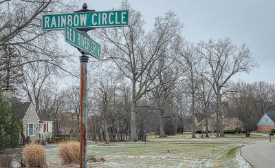  A dusting of snow covers the lawns on March 17 near the intersection of Rainbow Circle and Red River Drive in Lathrup Village. 