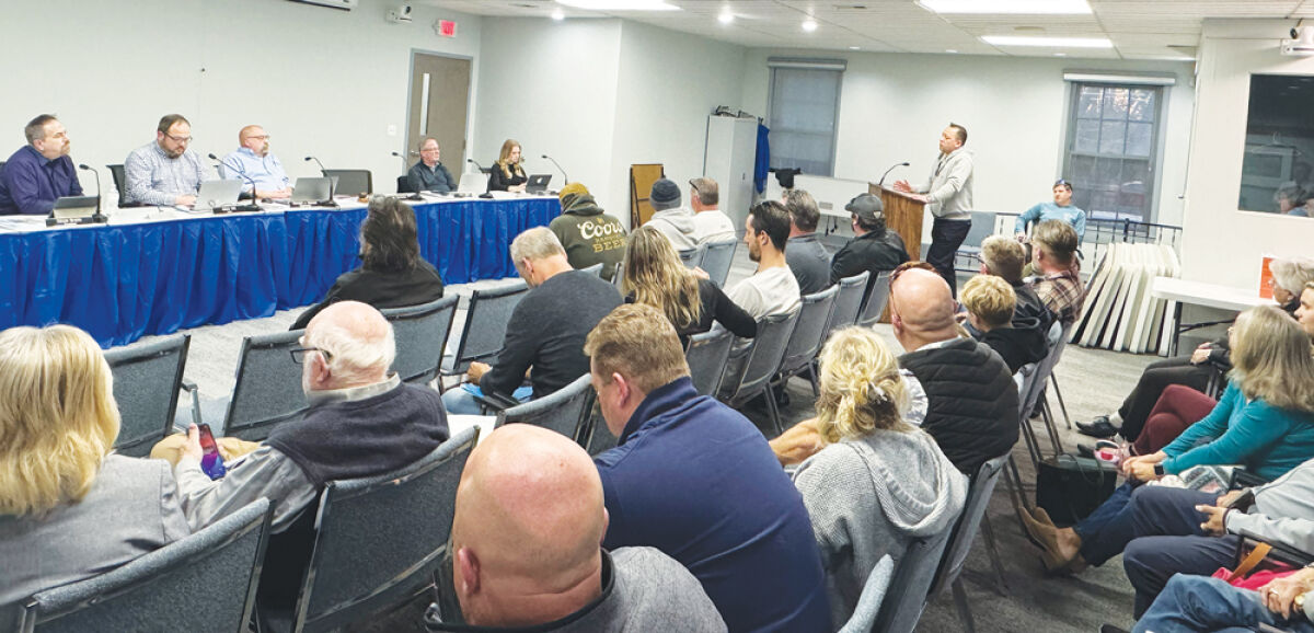  Harrison Township residents gathered on March 9 to voice their opinions about a special assessment district.  