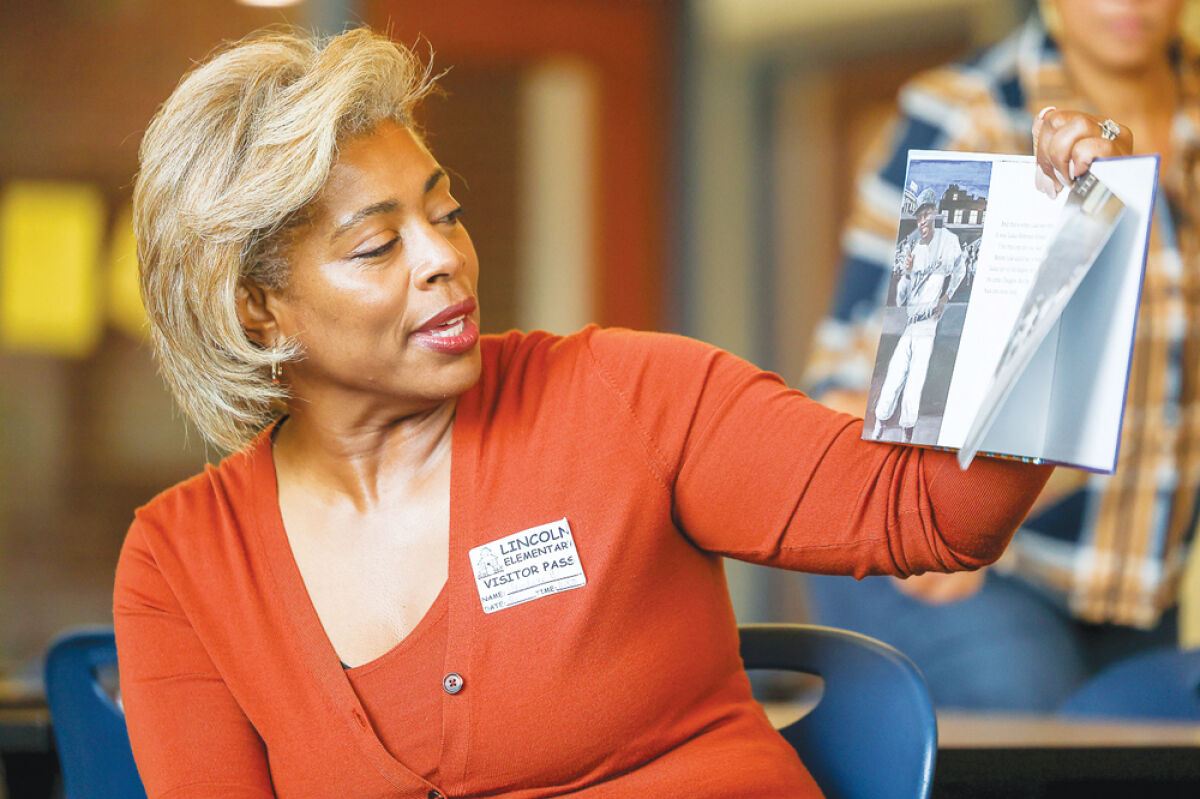  Greater Southeast Chapter (MI) of The Links Incorporated President Candace Cooper reads  “Luke Goes to Bat” by Rachel Isadora March 10 at Lincoln Elementary School in Warren. Members of the Greater Southeast Chapter volunteer their time to various causes.  