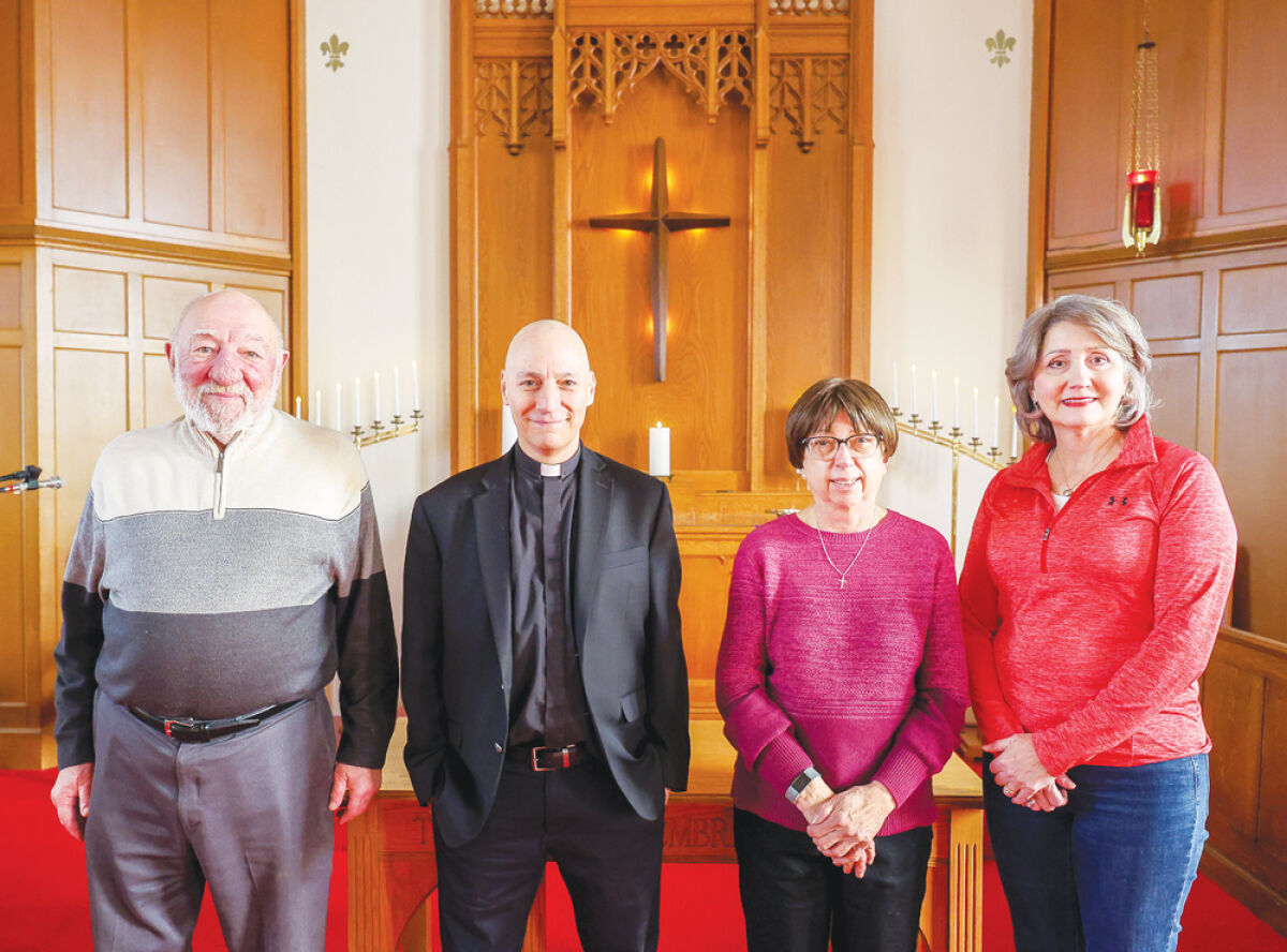  St. Paul United Church of Christ was established in 1864. Near right, the Rev. K.C. Lazzara views photos of the pastors at St. Paul United Church of Christ. “I’m hoping that the way I texture my service with scripture, with anecdotes, with quotes, everyone takes a little something,” he said.  