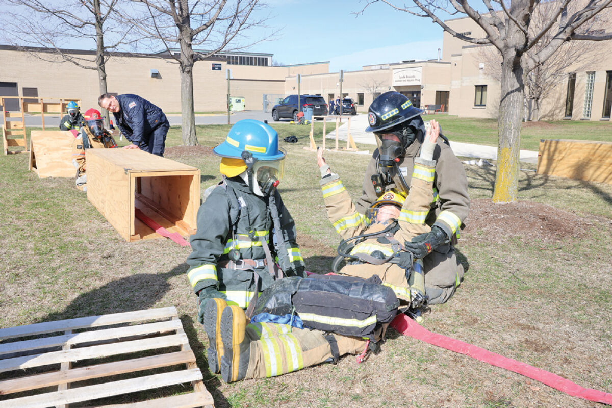  Firefighting students had the opportunity to practice on the Rapid  Intervention Team course while competing for the Golden Nozzle award  March 14 at Center Line High School.  