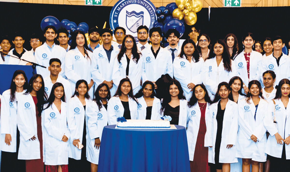  Medical students at St. Martinus University don their white coats as a symbol of being welcomed into the medical profession. 