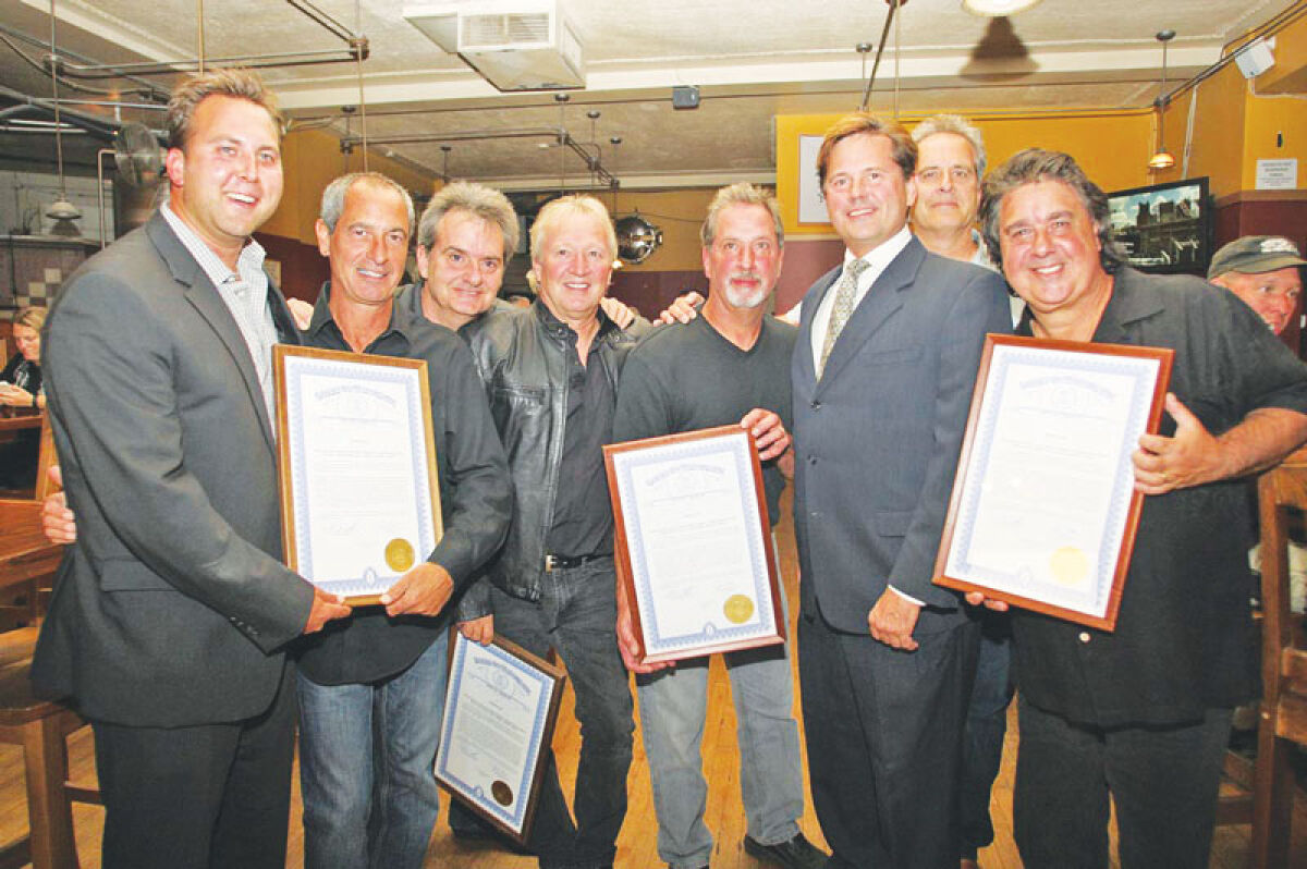  Family, friends and fans are remembering Adrenalin drummer Brian Pastoria, far right, who died March 18. In this photo from September 2015 at Kuhnhenn Brewery Co. in Warren, the band received a proclamation after being inducted into the online Michigan Rock and Roll Legends Hall of Fame. 